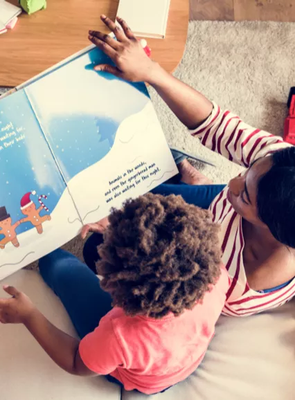 Mother and child reading a book